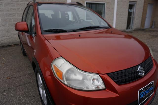 used 2009 Suzuki SX4 car, priced at $5,477