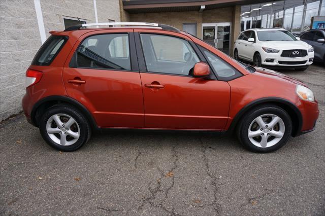 used 2009 Suzuki SX4 car, priced at $5,477