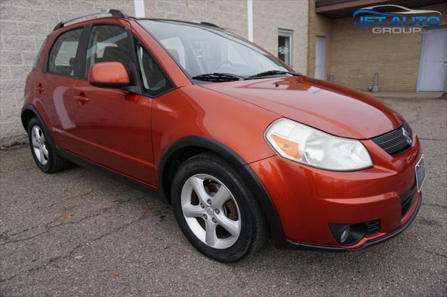 used 2009 Suzuki SX4 car, priced at $5,477