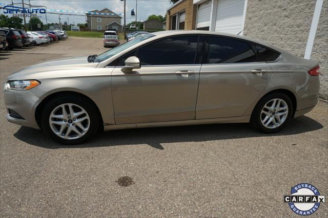 used 2016 Ford Fusion car, priced at $4,977