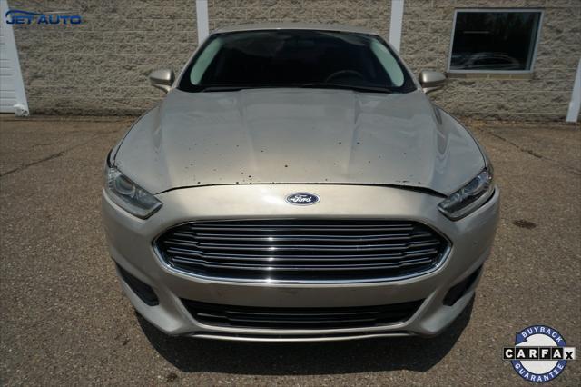 used 2016 Ford Fusion car, priced at $4,977