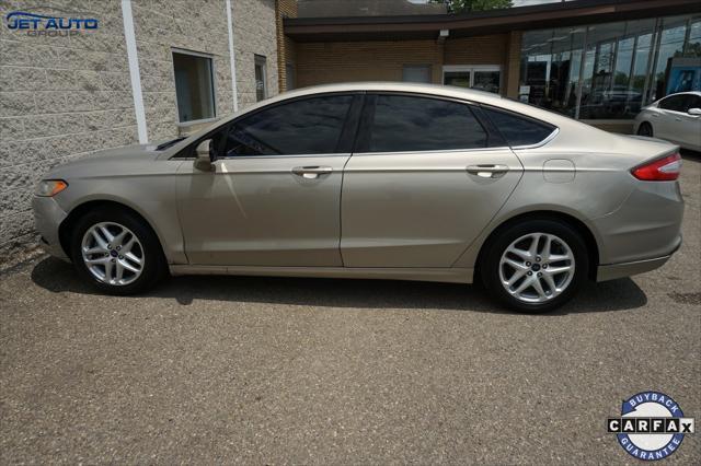 used 2016 Ford Fusion car, priced at $4,977