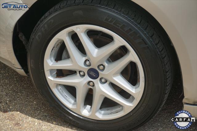 used 2016 Ford Fusion car, priced at $4,977