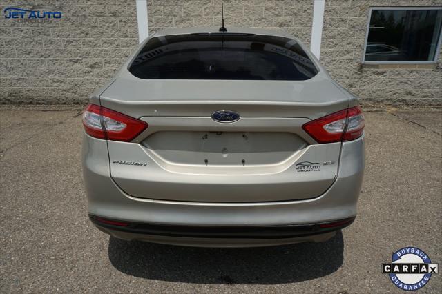 used 2016 Ford Fusion car, priced at $4,977
