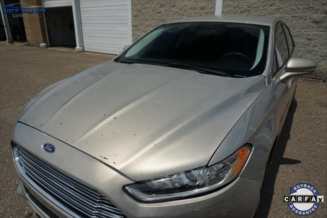 used 2016 Ford Fusion car, priced at $4,977