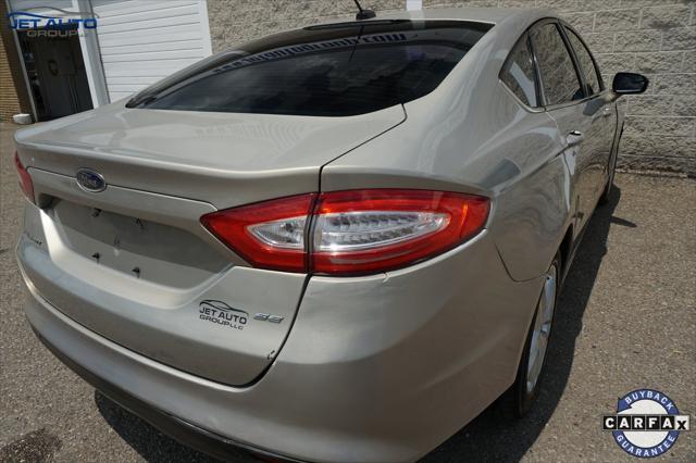 used 2016 Ford Fusion car, priced at $4,977