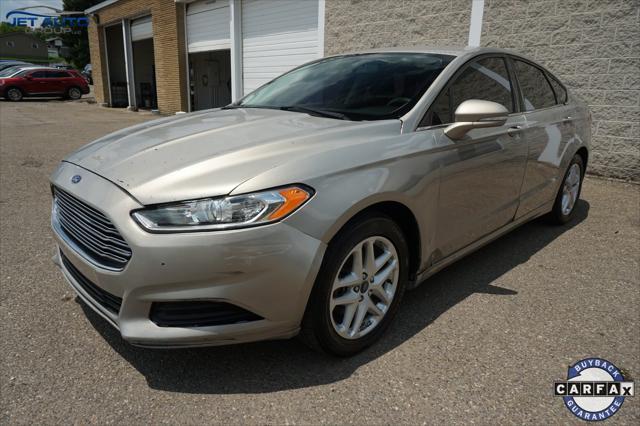 used 2016 Ford Fusion car, priced at $4,977