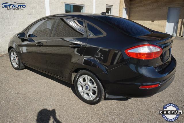 used 2014 Ford Fiesta car, priced at $5,977