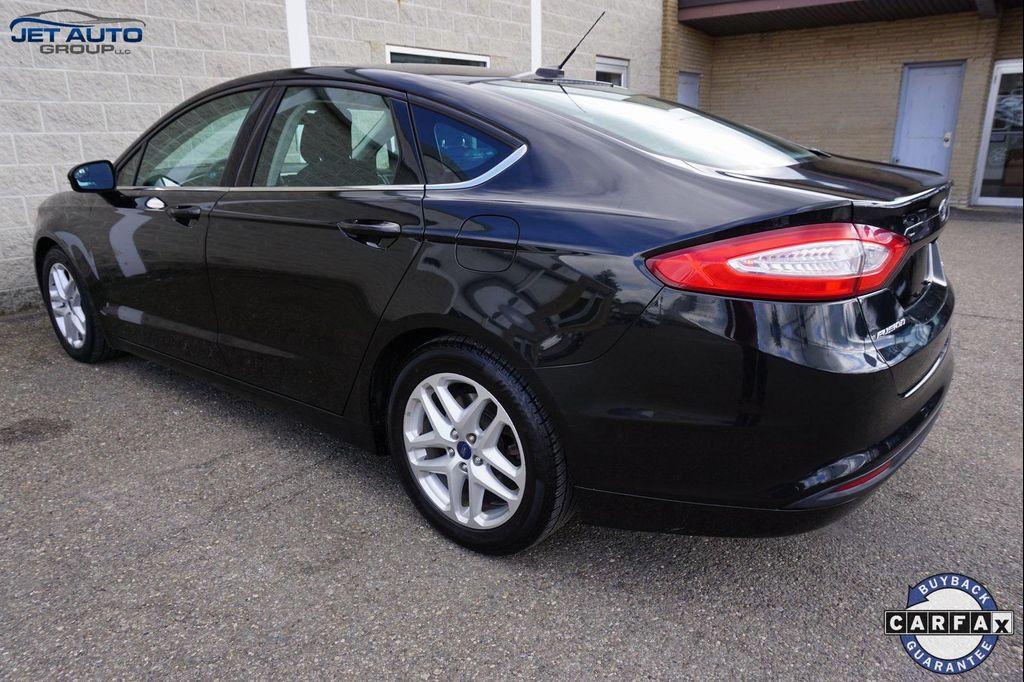 used 2015 Ford Fusion car, priced at $6,477