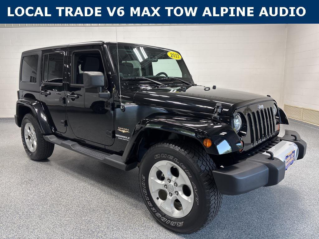 used 2013 Jeep Wrangler Unlimited car, priced at $18,991