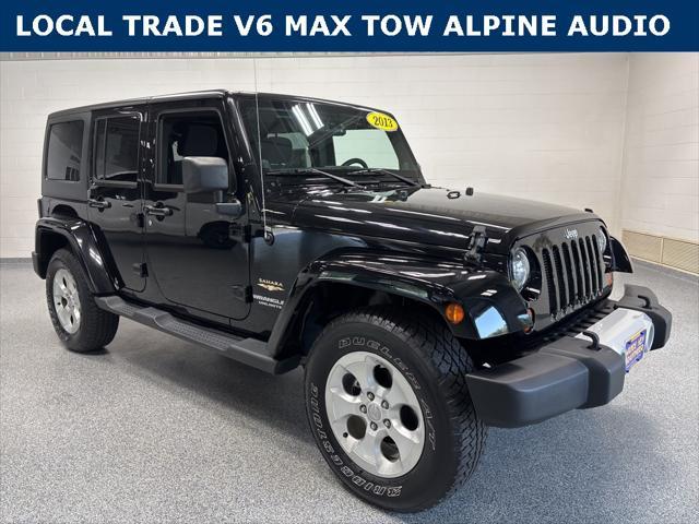 used 2013 Jeep Wrangler Unlimited car, priced at $18,991