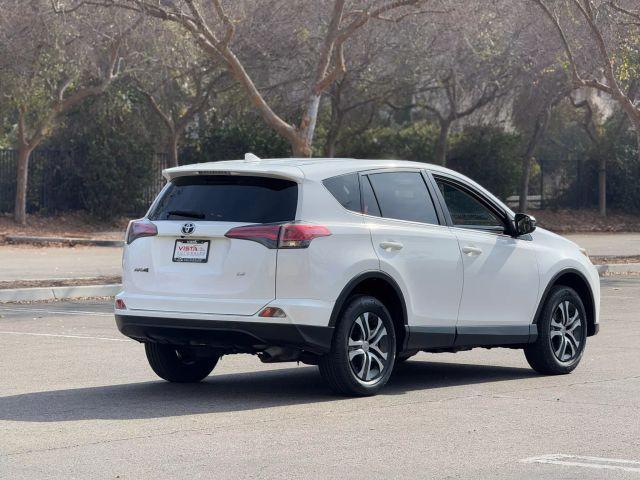used 2018 Toyota RAV4 car, priced at $19,995