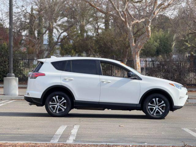 used 2018 Toyota RAV4 car, priced at $19,995