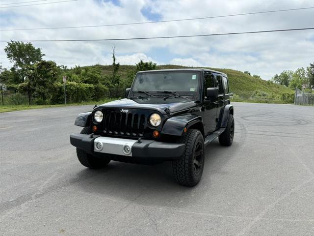 used 2013 Jeep Wrangler Unlimited car, priced at $13,786