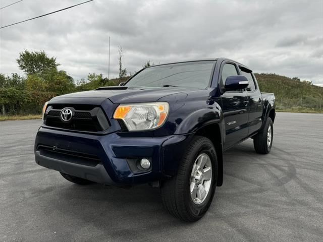 used 2013 Toyota Tacoma car, priced at $13,999