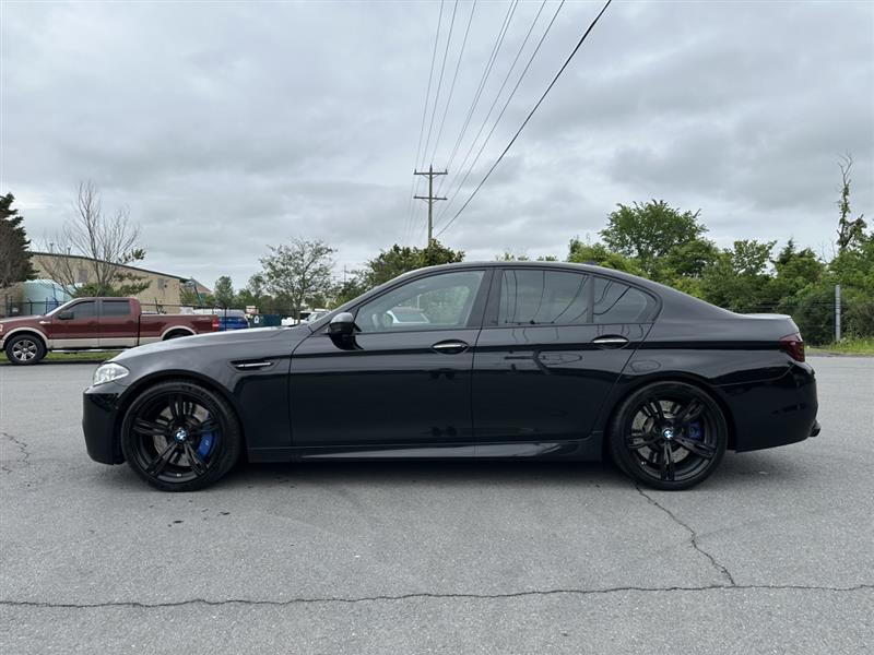used 2015 BMW M5 car, priced at $34,786