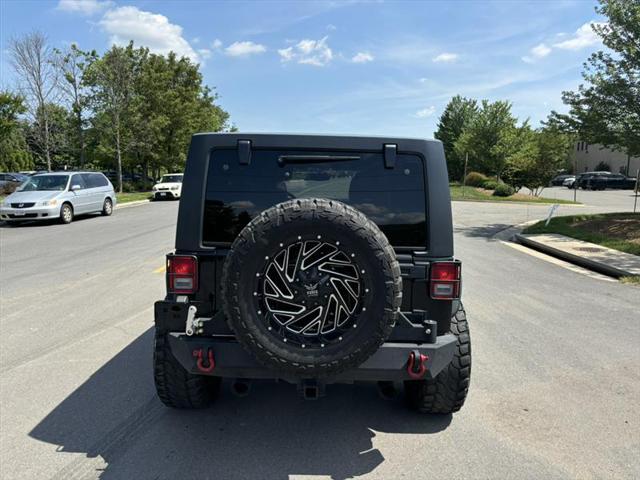 used 2015 Jeep Wrangler Unlimited car, priced at $29,999