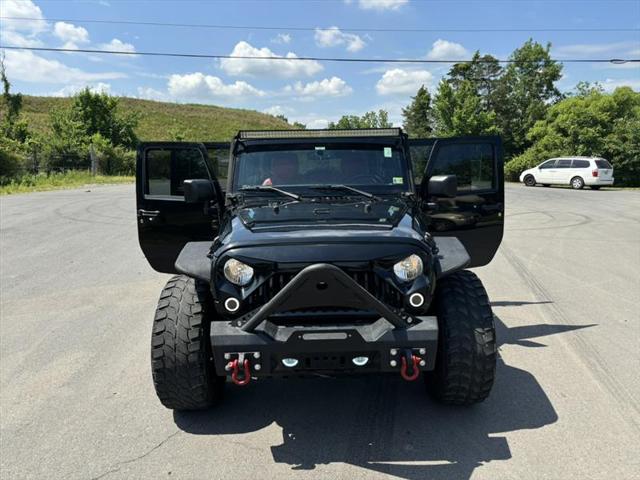 used 2015 Jeep Wrangler Unlimited car, priced at $29,999