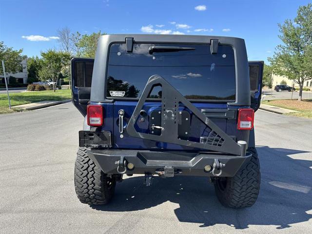 used 2013 Jeep Wrangler Unlimited car, priced at $20,999