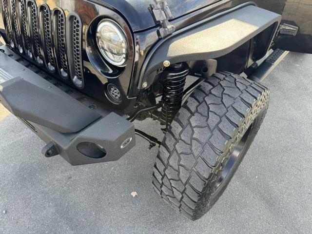 used 2014 Jeep Wrangler Unlimited car, priced at $15,999