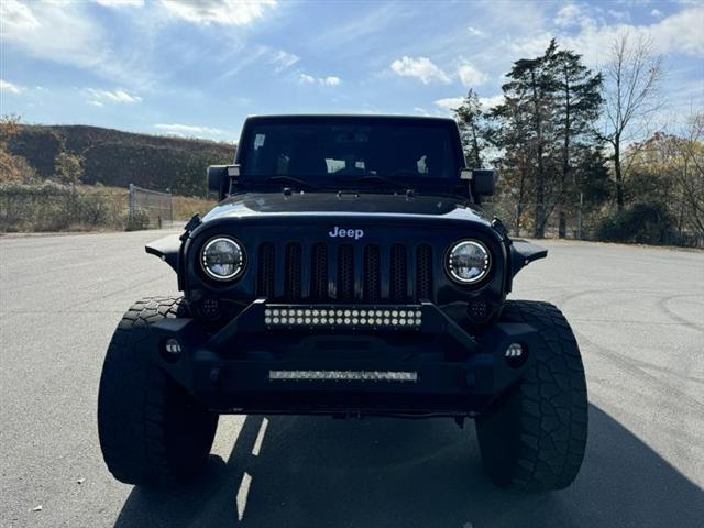 used 2014 Jeep Wrangler Unlimited car, priced at $15,999