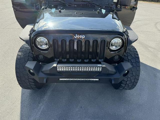 used 2014 Jeep Wrangler Unlimited car, priced at $15,999