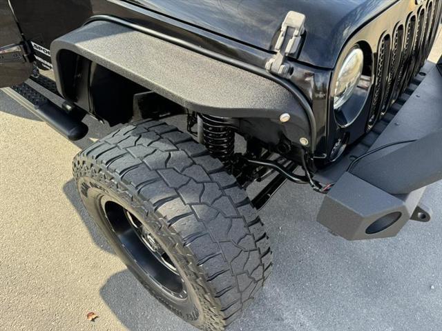 used 2014 Jeep Wrangler Unlimited car, priced at $15,999