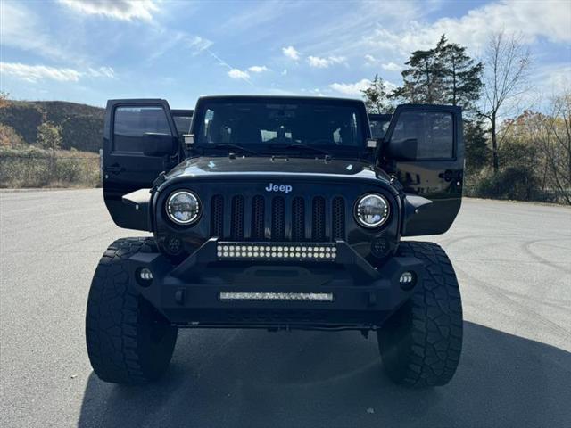 used 2014 Jeep Wrangler Unlimited car, priced at $15,999