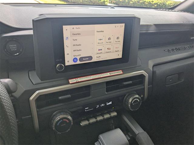 used 2025 Toyota Tacoma car, priced at $33,998