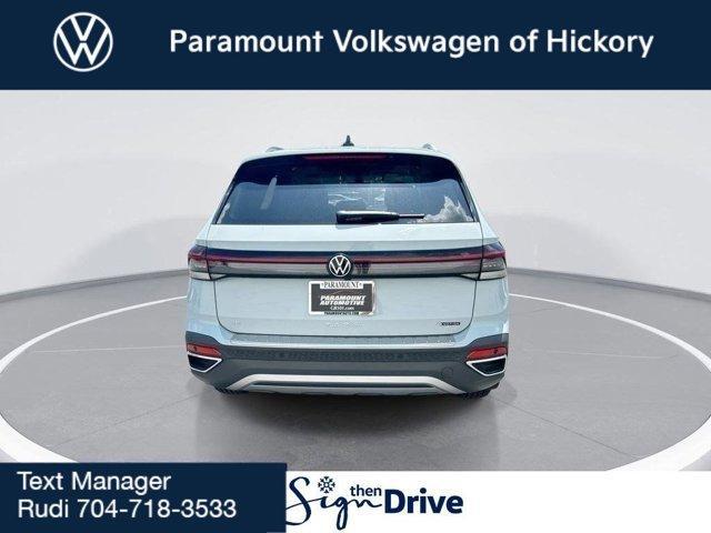 new 2025 Volkswagen Taos car, priced at $30,999