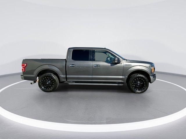 used 2018 Ford F-150 car, priced at $22,700