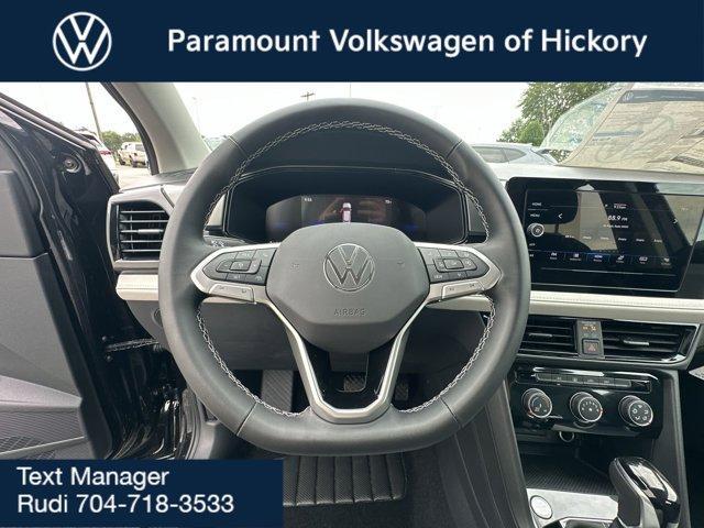 new 2025 Volkswagen Taos car, priced at $27,011