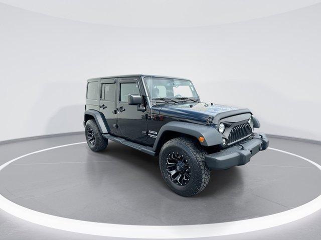 used 2017 Jeep Wrangler Unlimited car, priced at $23,994