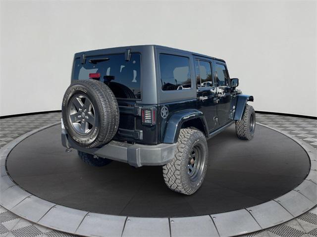 used 2015 Jeep Wrangler Unlimited car, priced at $22,900