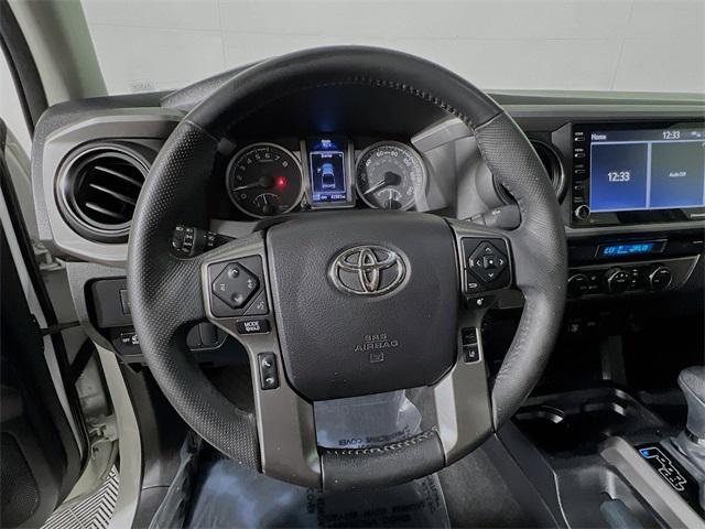 used 2021 Toyota Tacoma car, priced at $25,748