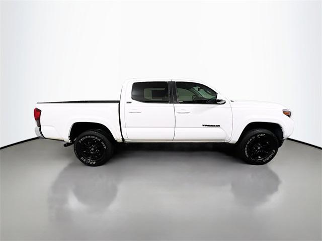 used 2021 Toyota Tacoma car, priced at $25,748