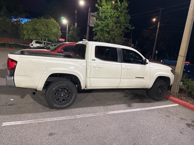 used 2021 Toyota Tacoma car, priced at $25,748