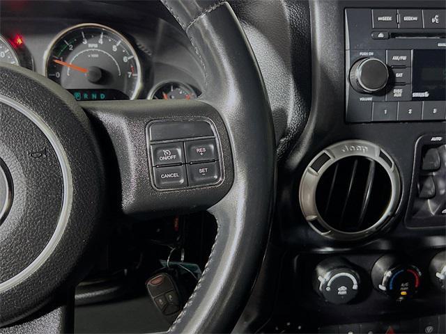 used 2015 Jeep Wrangler Unlimited car, priced at $19,943