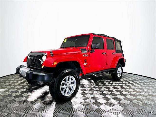 used 2015 Jeep Wrangler Unlimited car, priced at $19,943