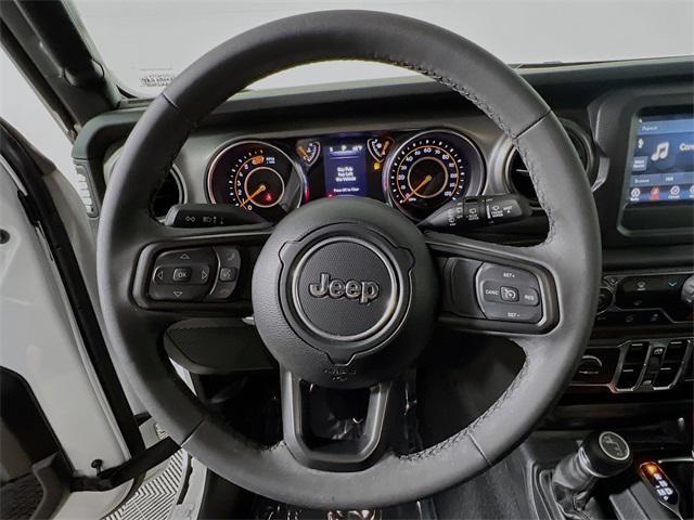 used 2023 Jeep Wrangler car, priced at $33,695