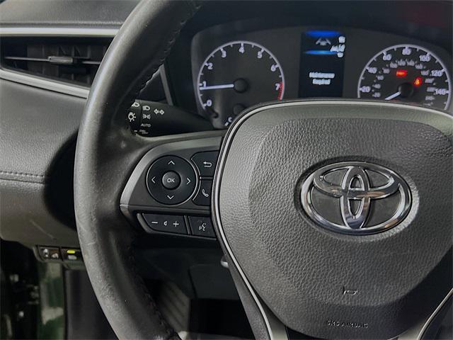 used 2023 Toyota Corolla Cross car, priced at $23,559