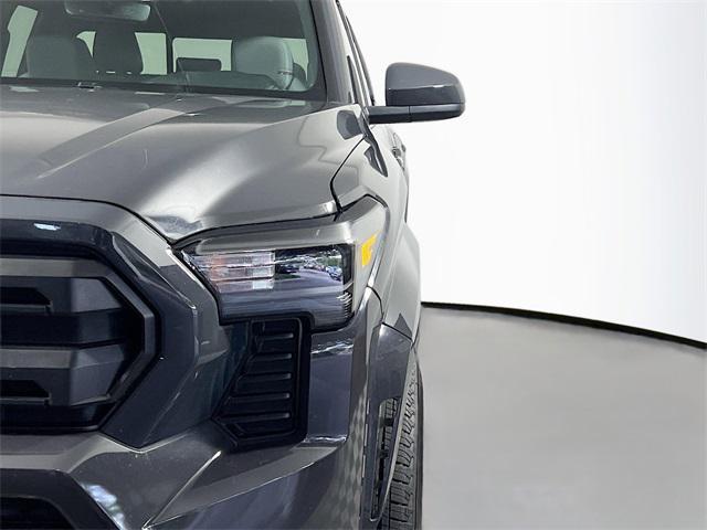 used 2024 Toyota Tacoma car, priced at $35,090