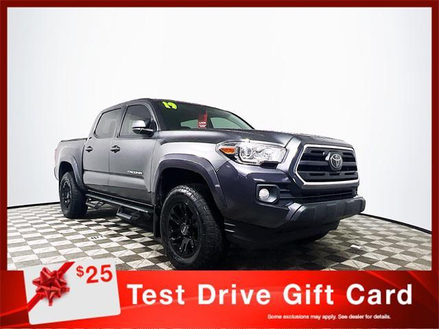 used 2019 Toyota Tacoma car, priced at $27,904