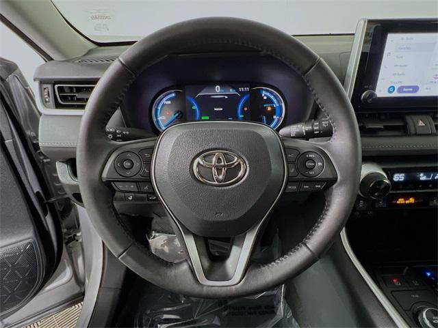 used 2023 Toyota RAV4 Hybrid car, priced at $32,227