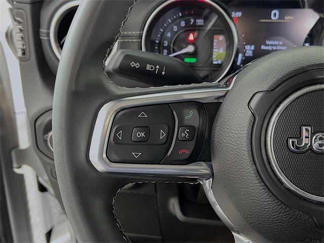 used 2023 Jeep Wrangler 4xe car, priced at $32,358