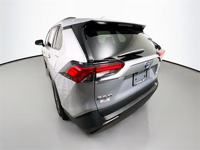 used 2024 Toyota RAV4 Hybrid car, priced at $30,477