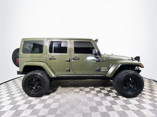 used 2015 Jeep Wrangler Unlimited car, priced at $19,041