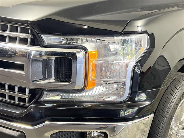 used 2018 Ford F-150 car, priced at $26,366
