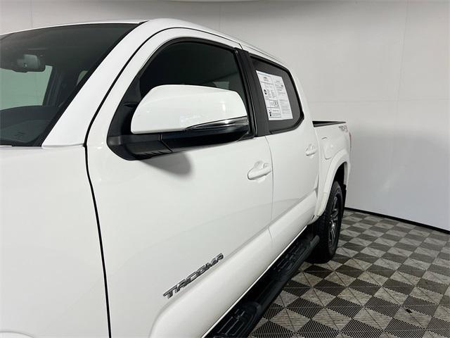 used 2018 Toyota Tacoma car, priced at $29,141