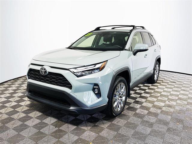 used 2023 Toyota RAV4 car, priced at $30,219